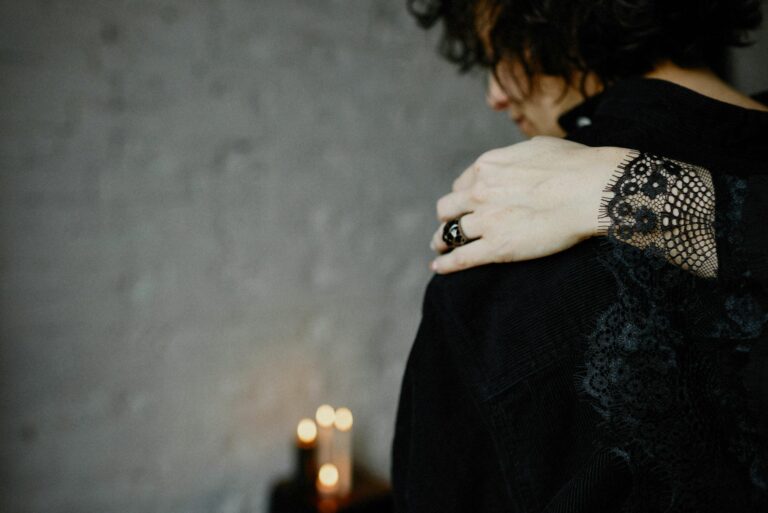 A comforting embrace during a moment of grief, symbolizing support and mourning.